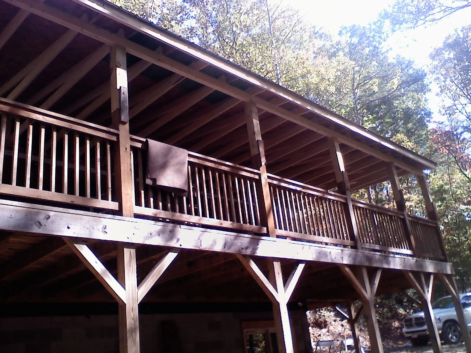 Timber framing under a new elevated porch and deck — Roof Leak Repair in Cashiers by Roofing Brothers